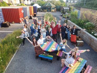 Group photo with arms out