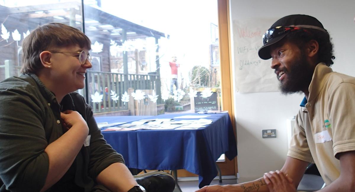 Two members chatting at Vauxhall City Farm